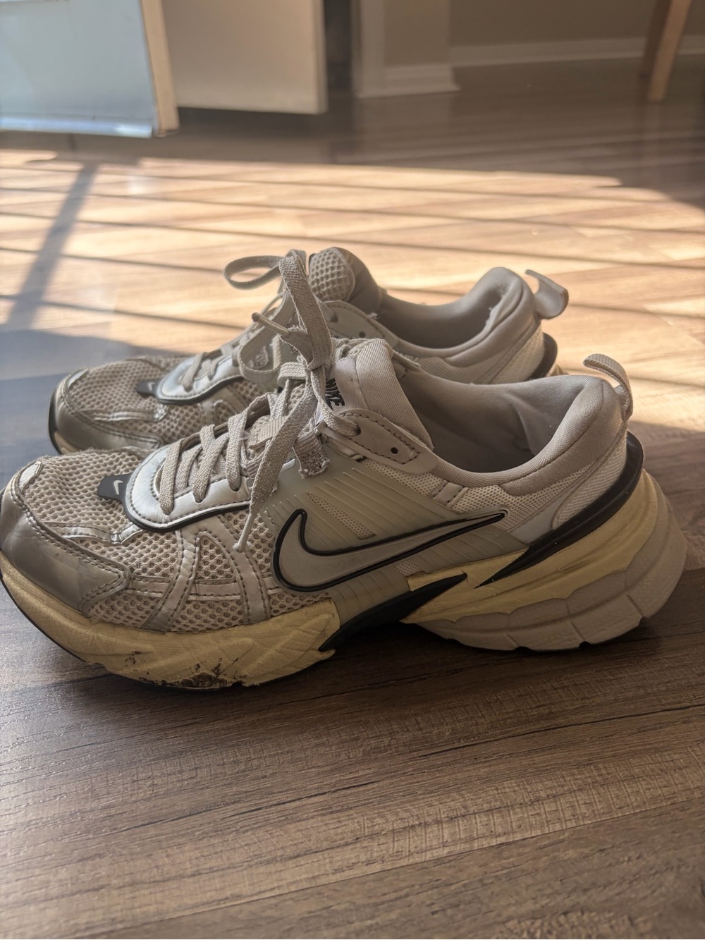 Nike White and Beige Trainers with Black Swoosh